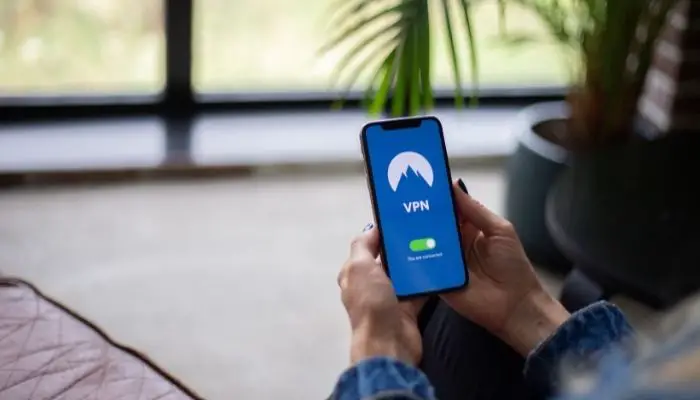 A person using a VPN on their phone