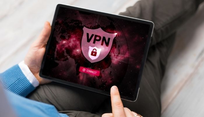 A man using a VPN on his tablet